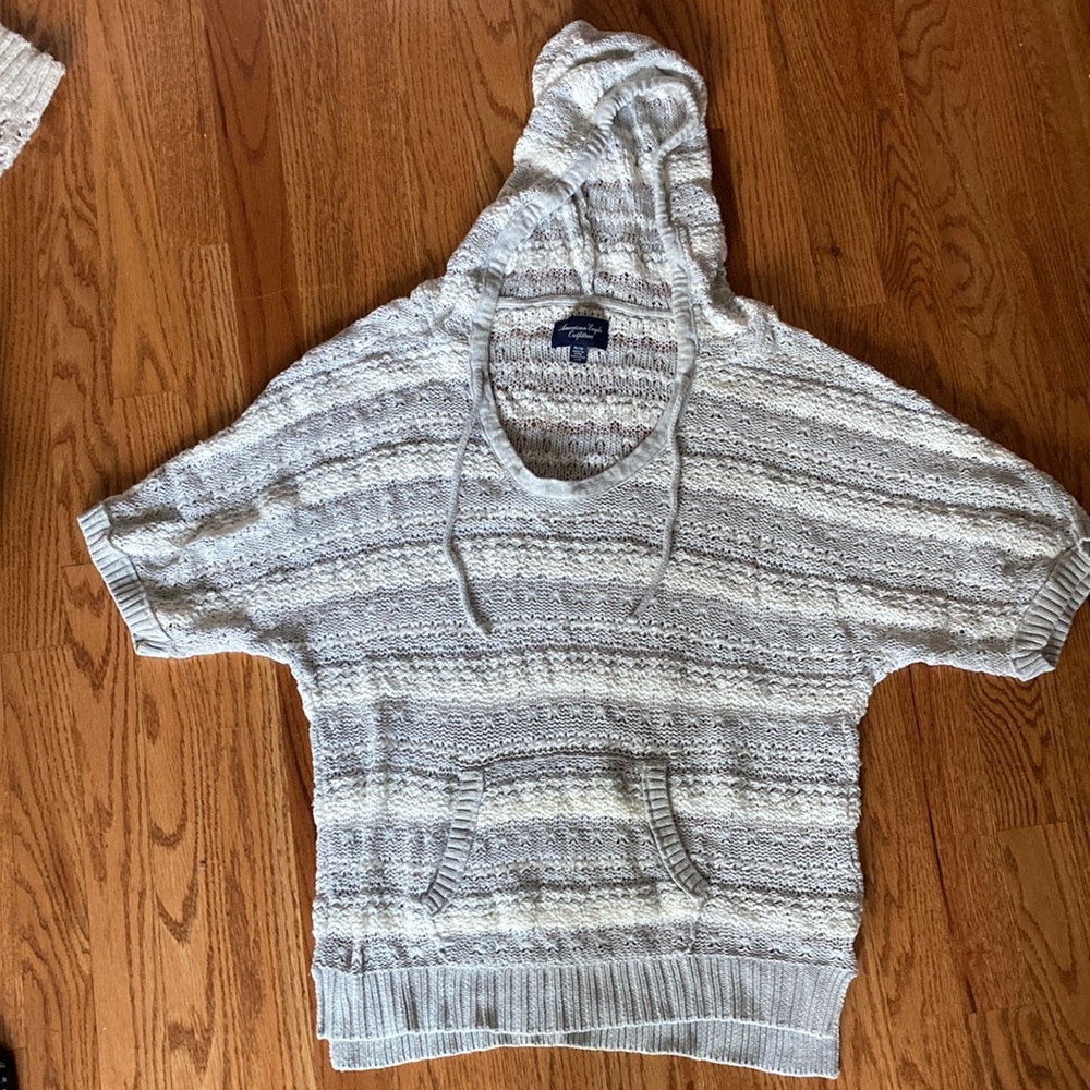 American Eagle Woman’s sweater. Gray/white with drawstring hood.